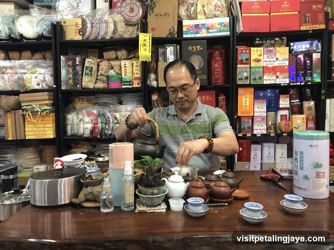 Tea Shop Interior with Staff Brewing Tea