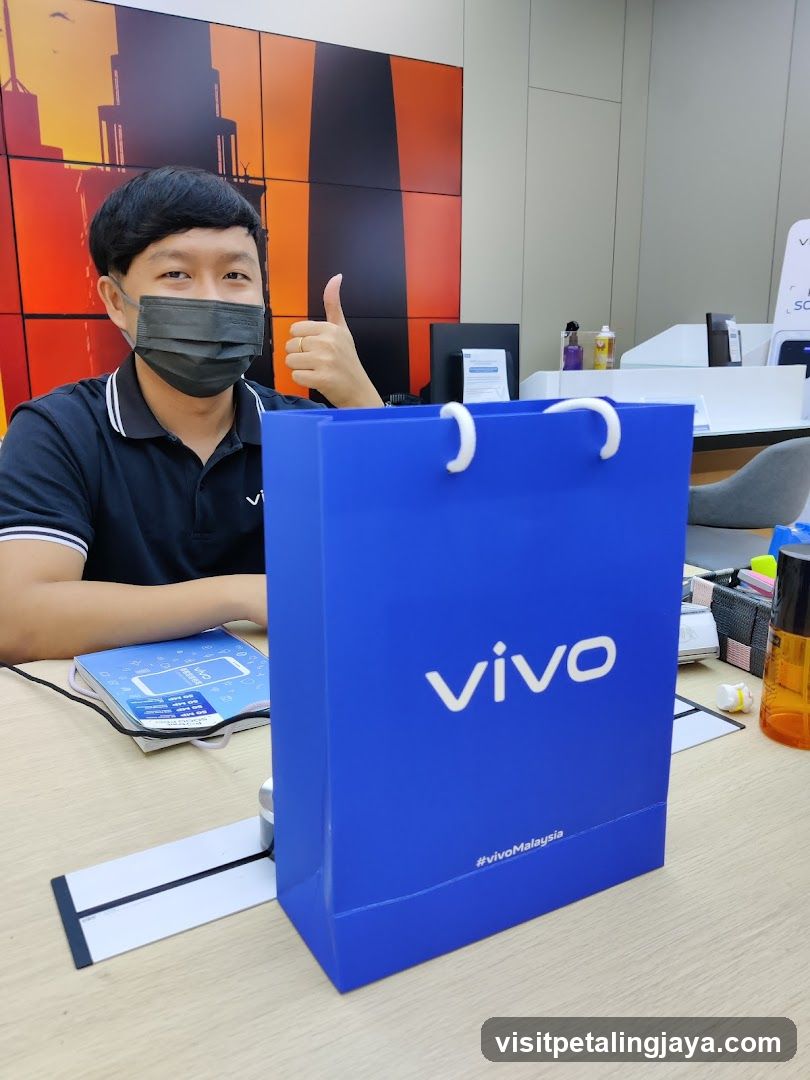 Vivo Store Interior with Staff and Shopping Bag