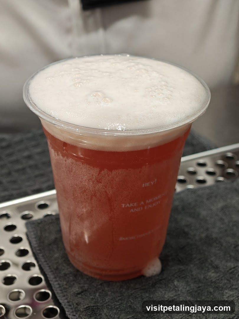 Pink Iced Drink with Foam