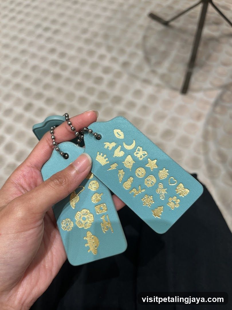 Blue Keychains with Gold Symbols