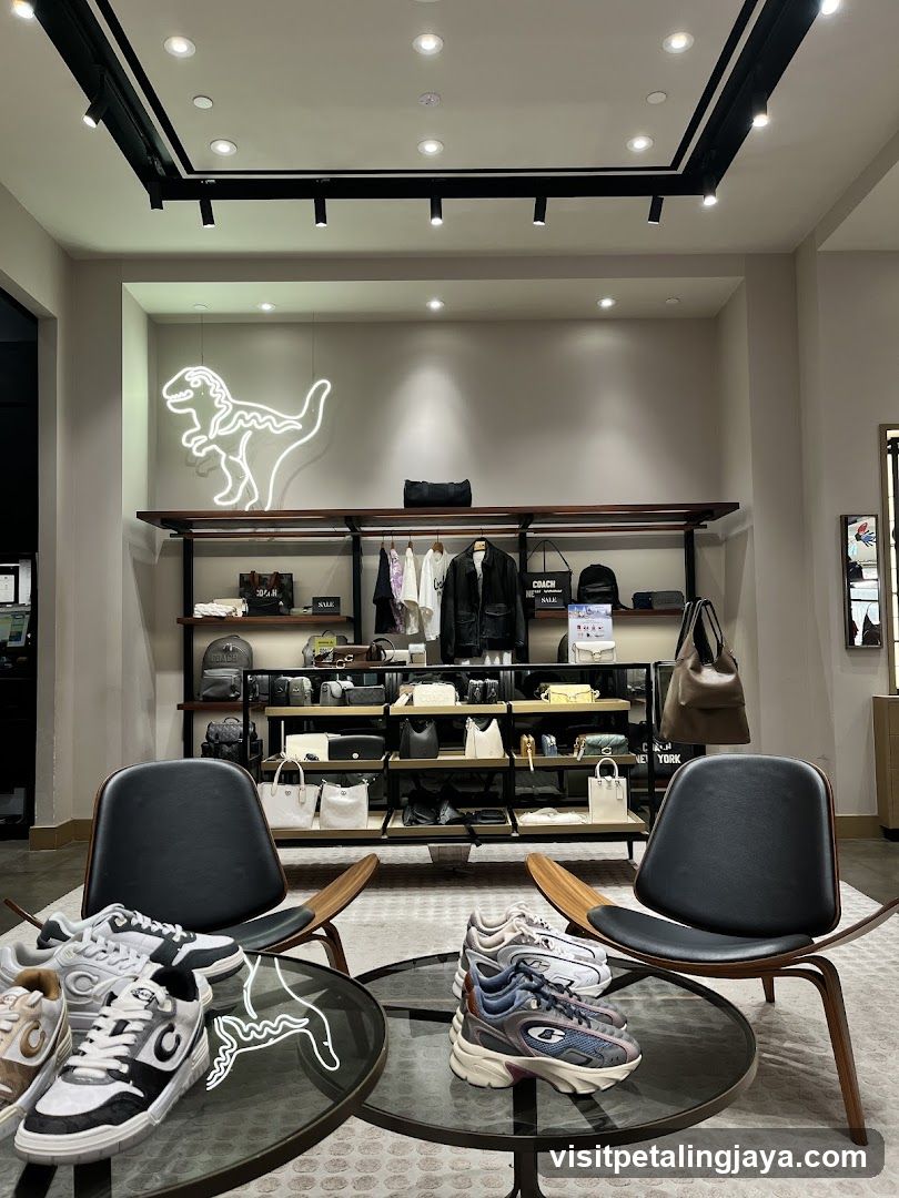 Interior of a modern retail store with sneakers and fashion items
