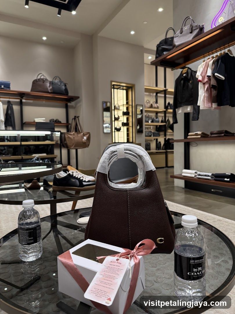 Coach Store Interior with Gift Box and Water Bottles