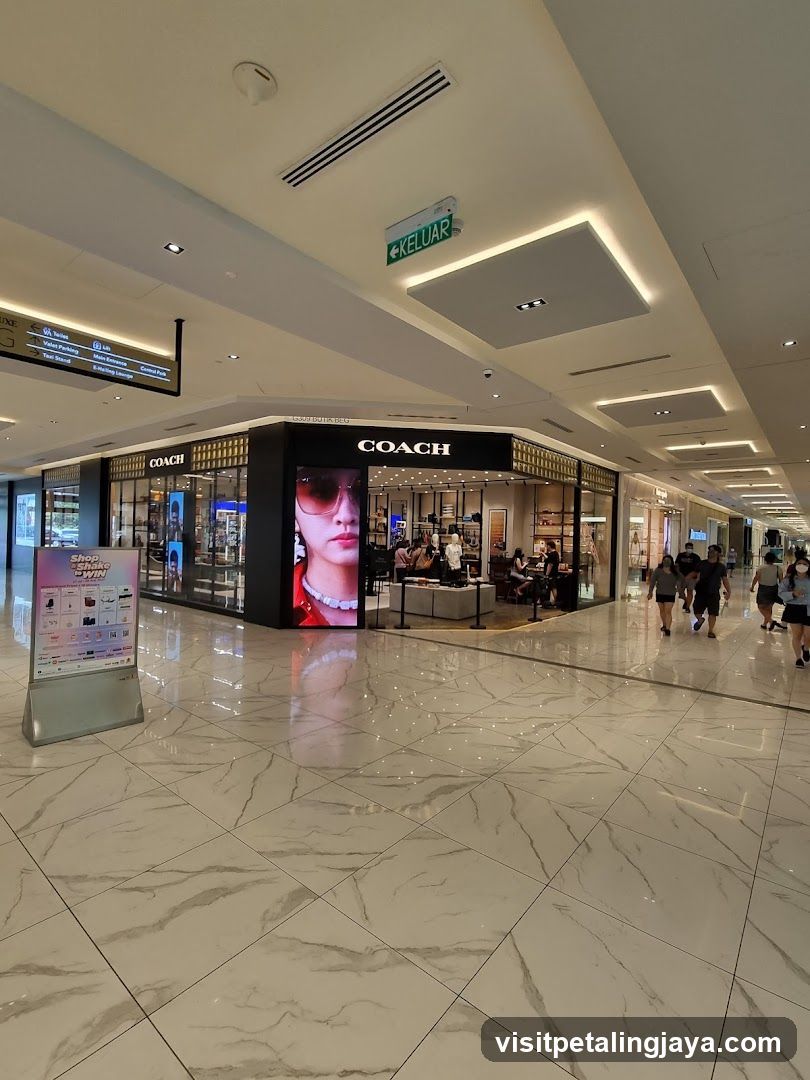 Shopping Mall Interior with Coach Storefront