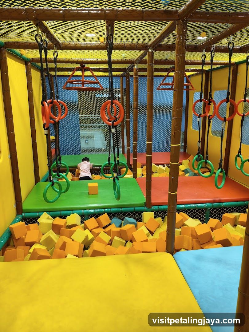 Indoor Play Area with Foam Pit and Gymnastic Rings