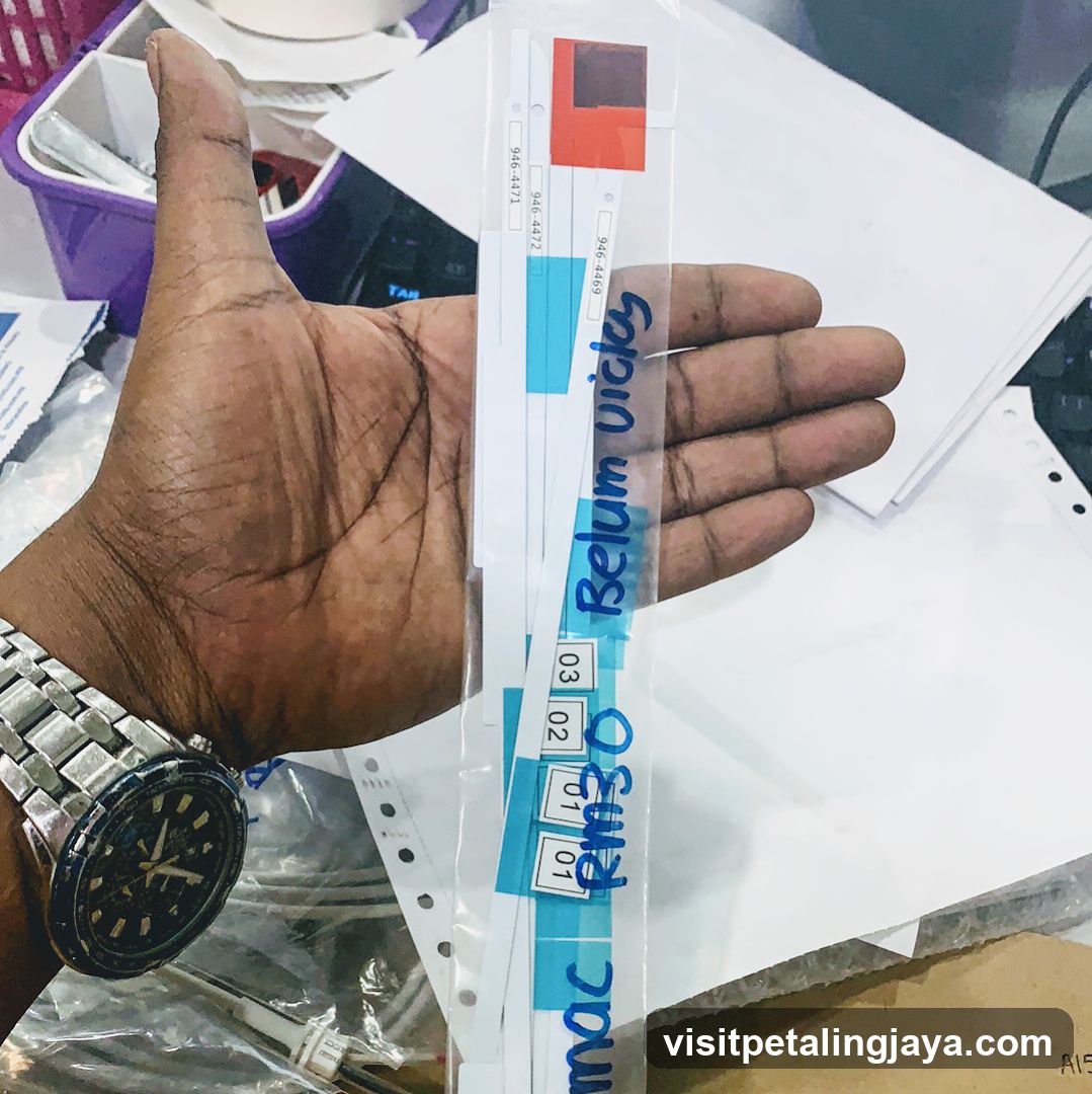 Hand holding medical test strips