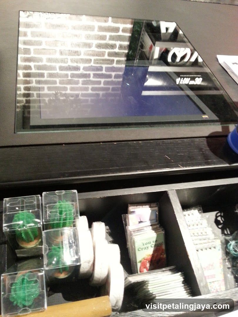 Drawer contents with small items and packaged goods