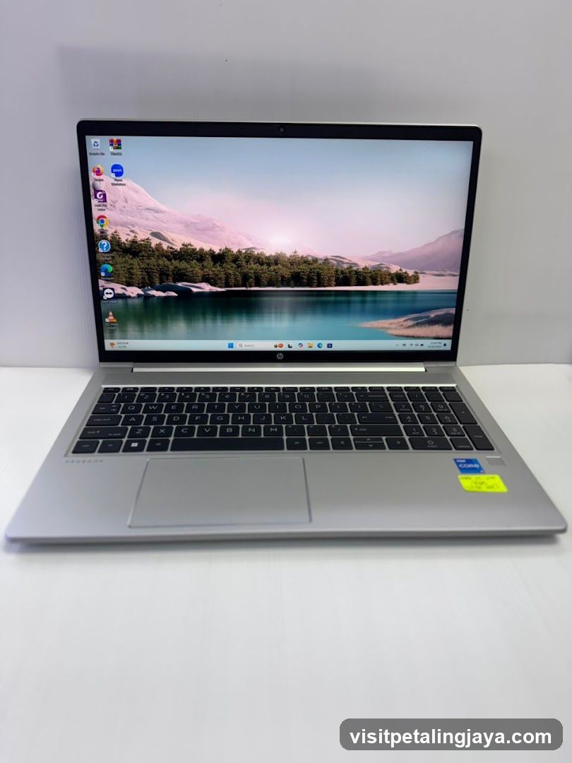 HP Laptop on White Surface