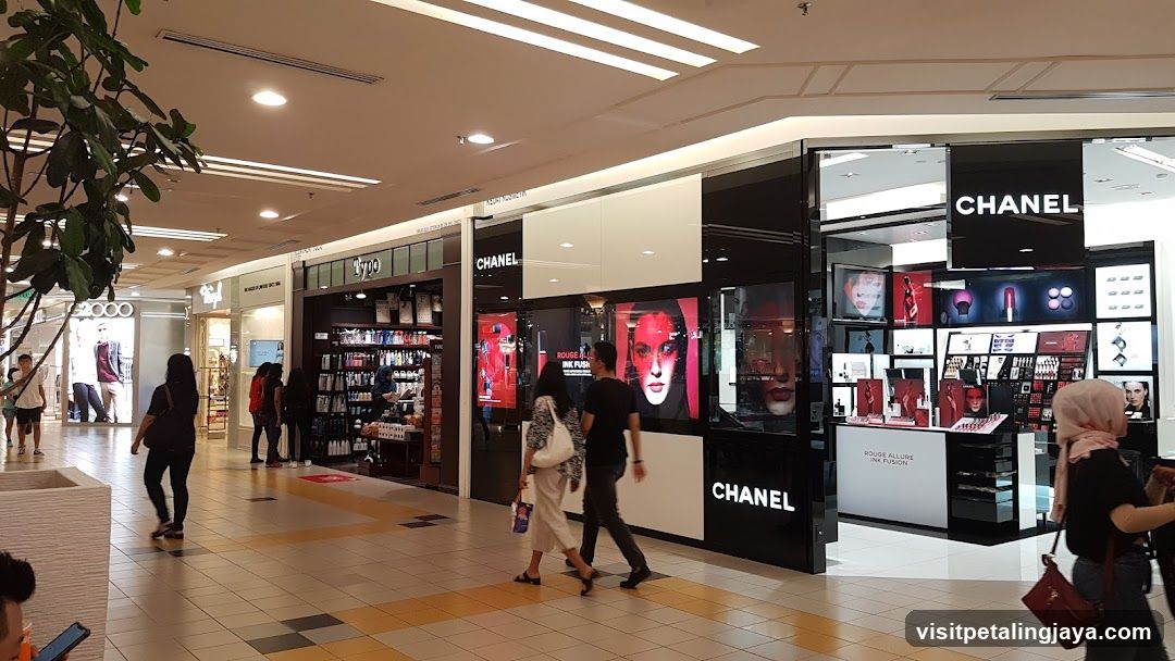 Shopping Mall Interior with Chanel Storefront