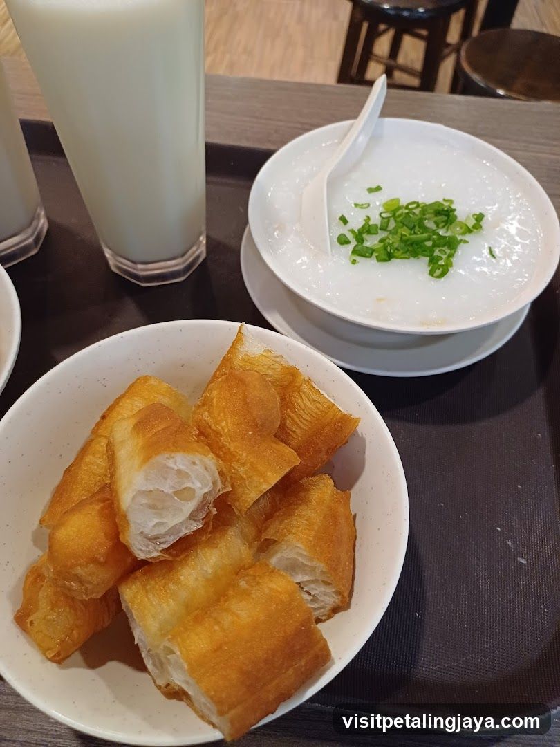 Breakfast Meal with Porridge and Fried Dough