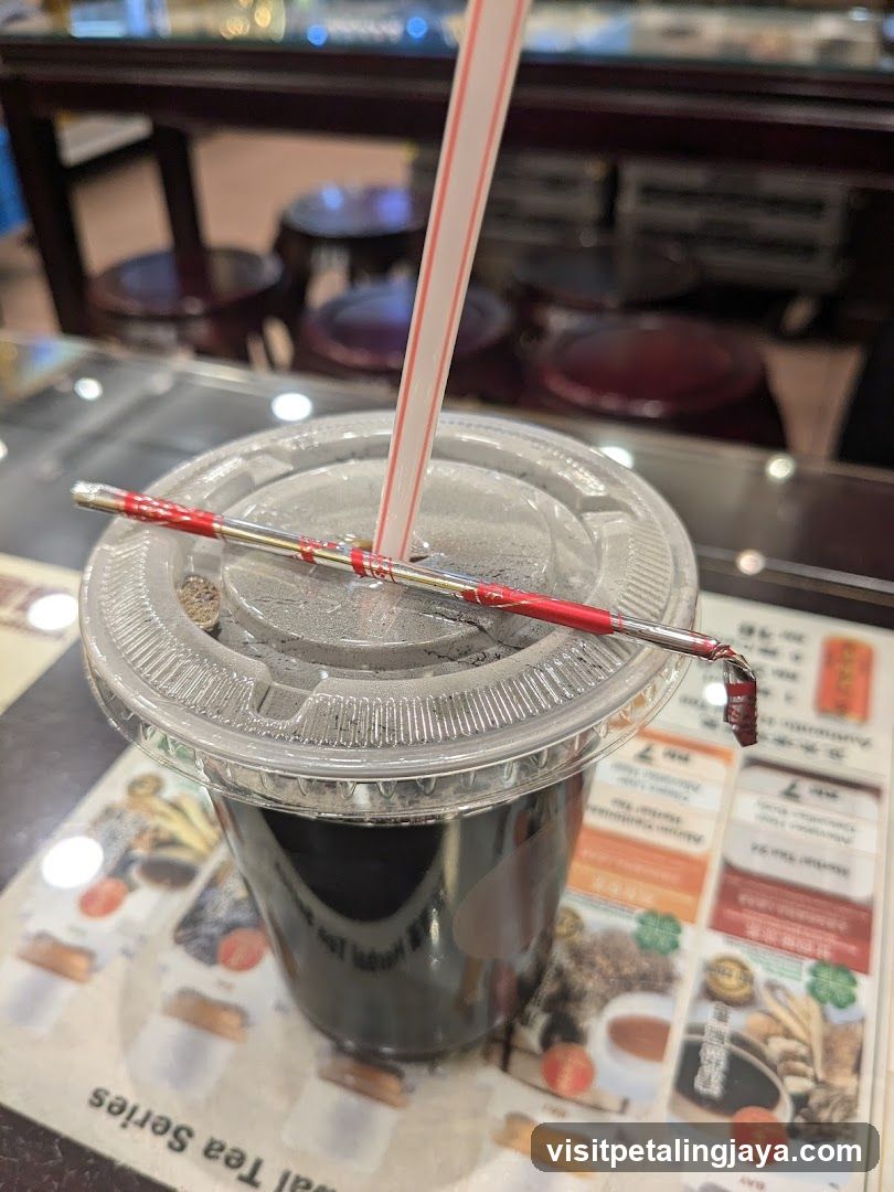 Iced Tea with Straw and Chopstick
