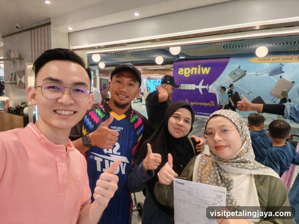 Group selfie in mall food court area