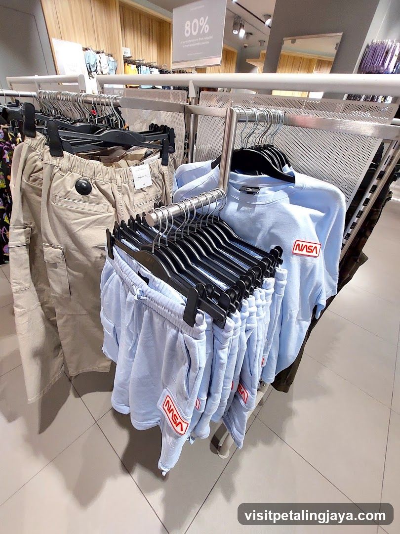 Clothing Display Rack with NASA Apparel and Khaki Pants