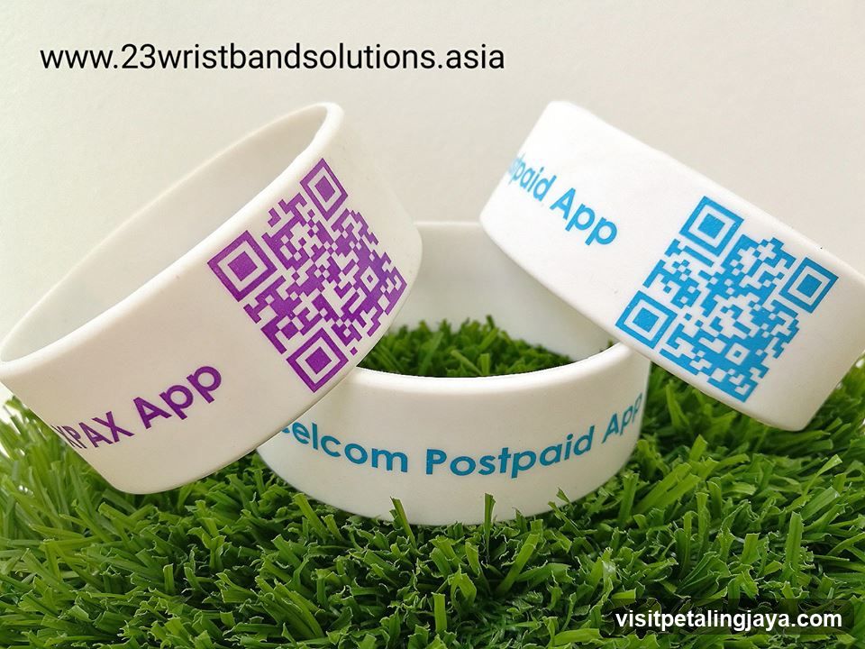 QR Code Wristbands on Grass