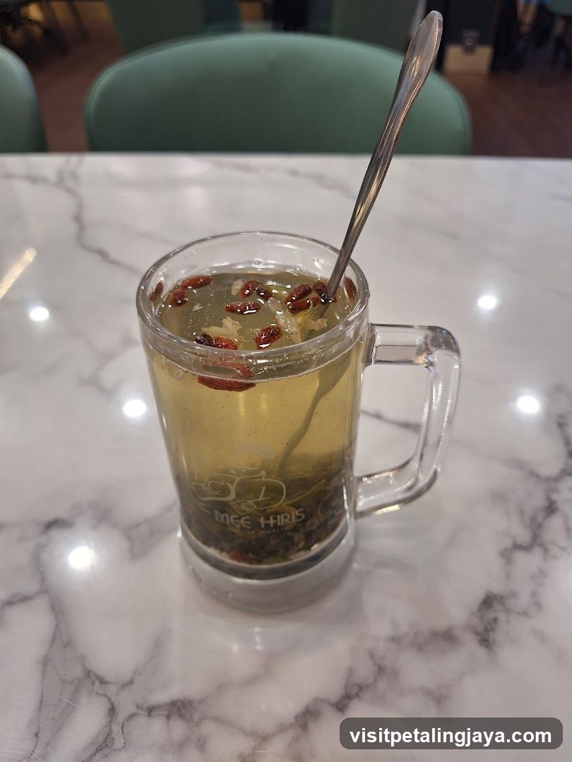 Mug of Herbal Tea with Goji Berries