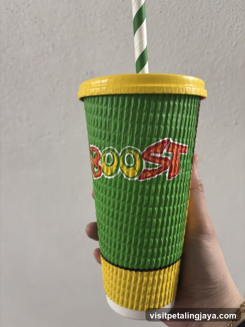 Boost Cup with Green and Yellow Design