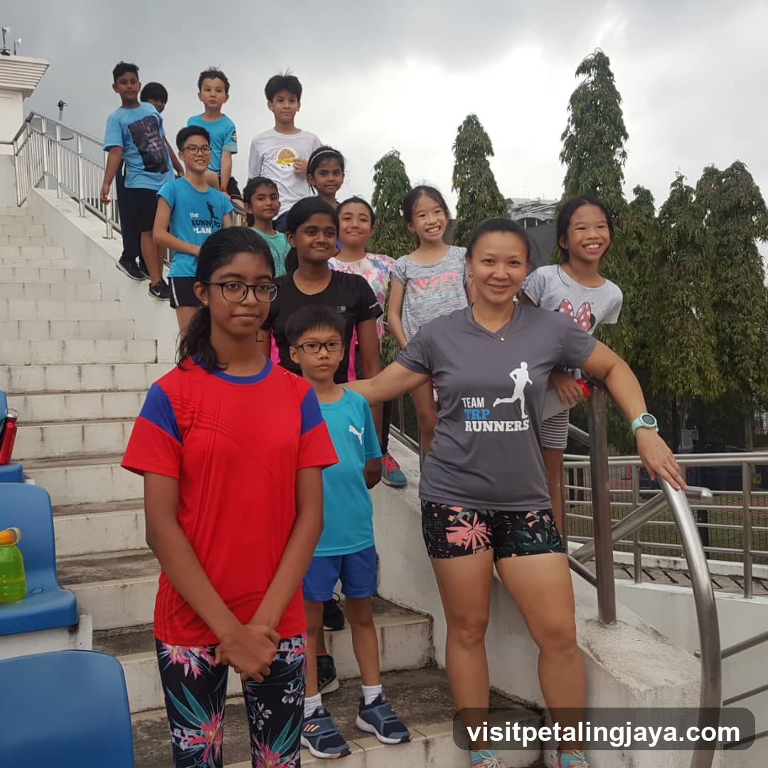 Group of runners on stadium steps