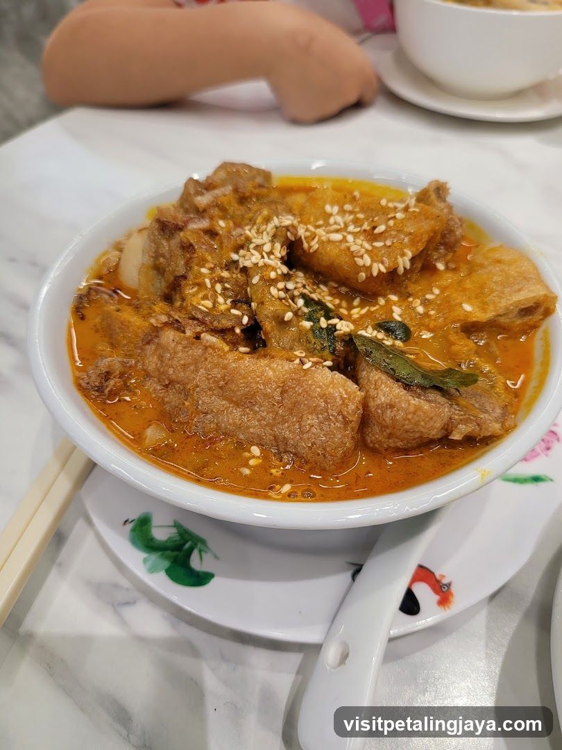 Curry Fish Head with Sesame Seeds