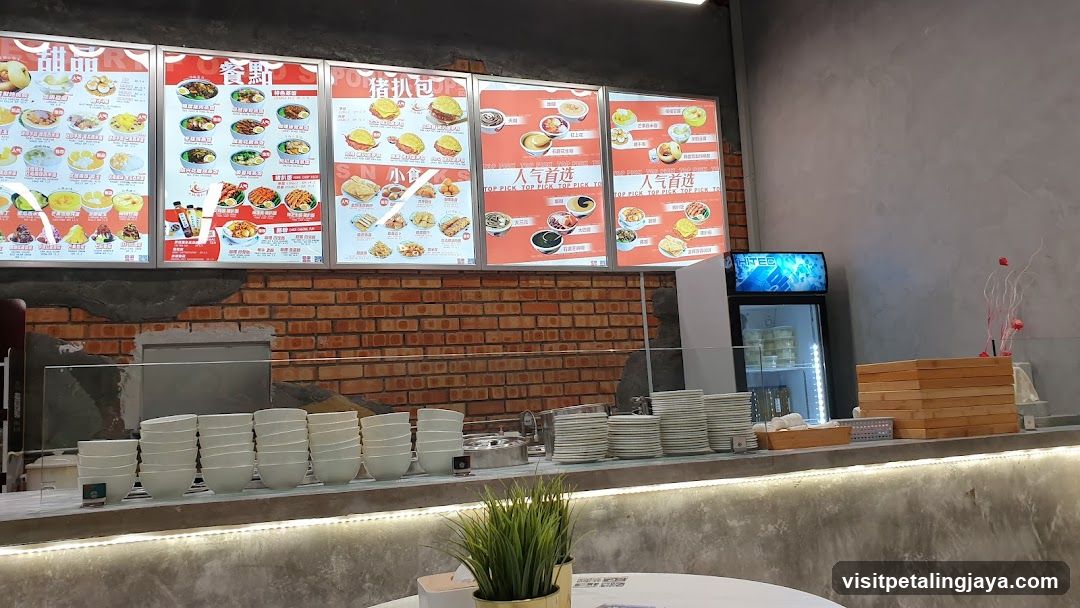 Restaurant Interior with Menu Boards and Stacks of Plates