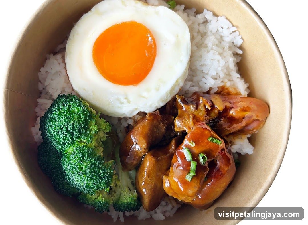 Fried Egg Rice Bowl with Broccoli and Chicken