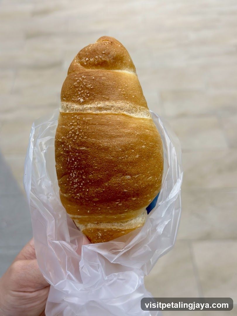 Croissant in plastic bag