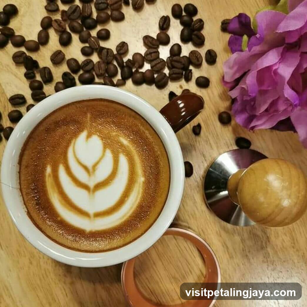 Latte Art Coffee Cup with Beans and Flower