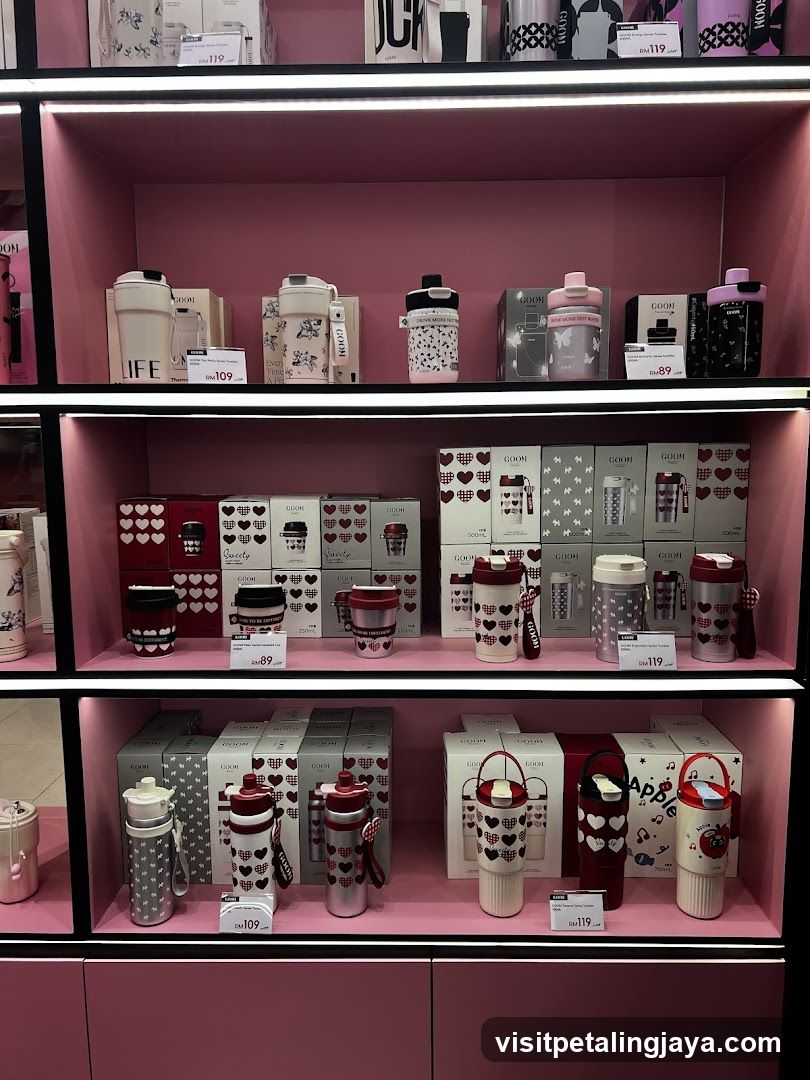 Pink Shelves with Thermos Cups and Bottles
