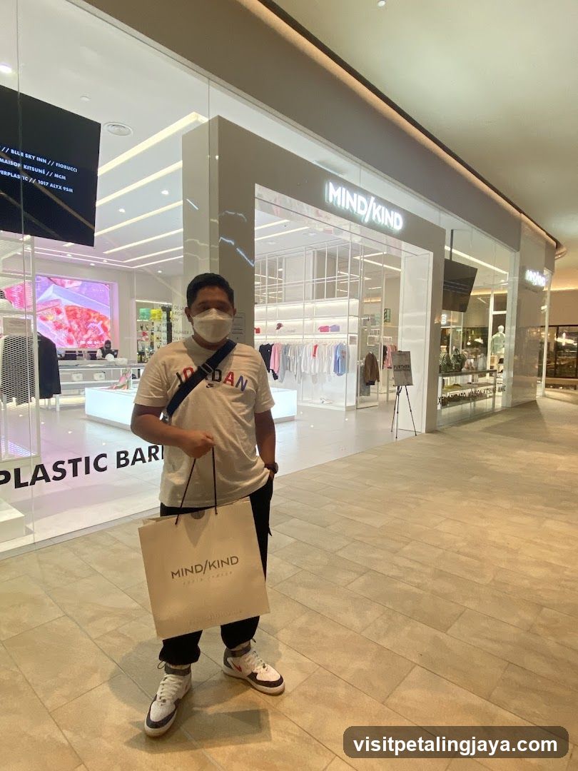 Person with shopping bag in mall