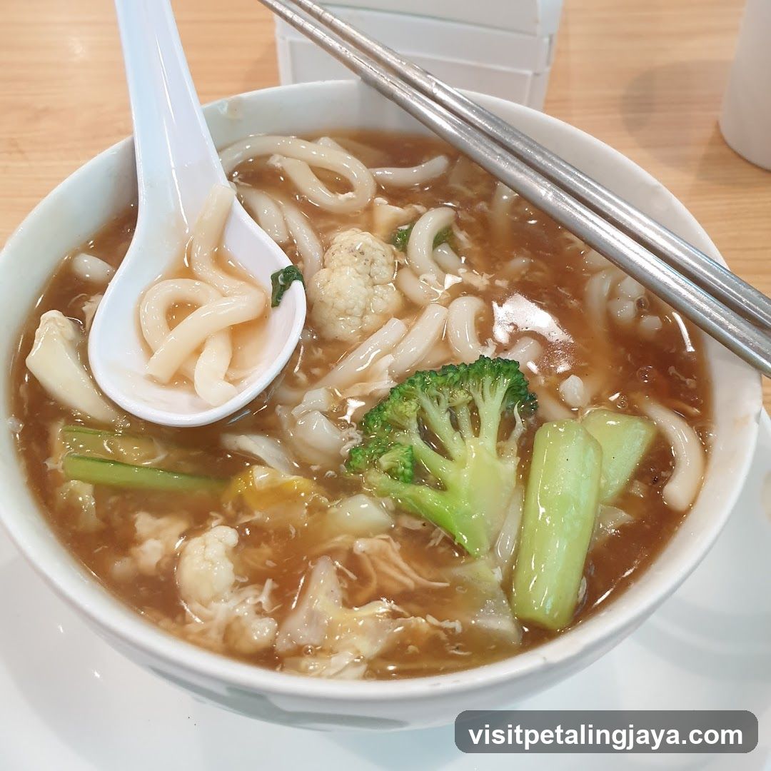 Bowl of Noodle Soup with Vegetables