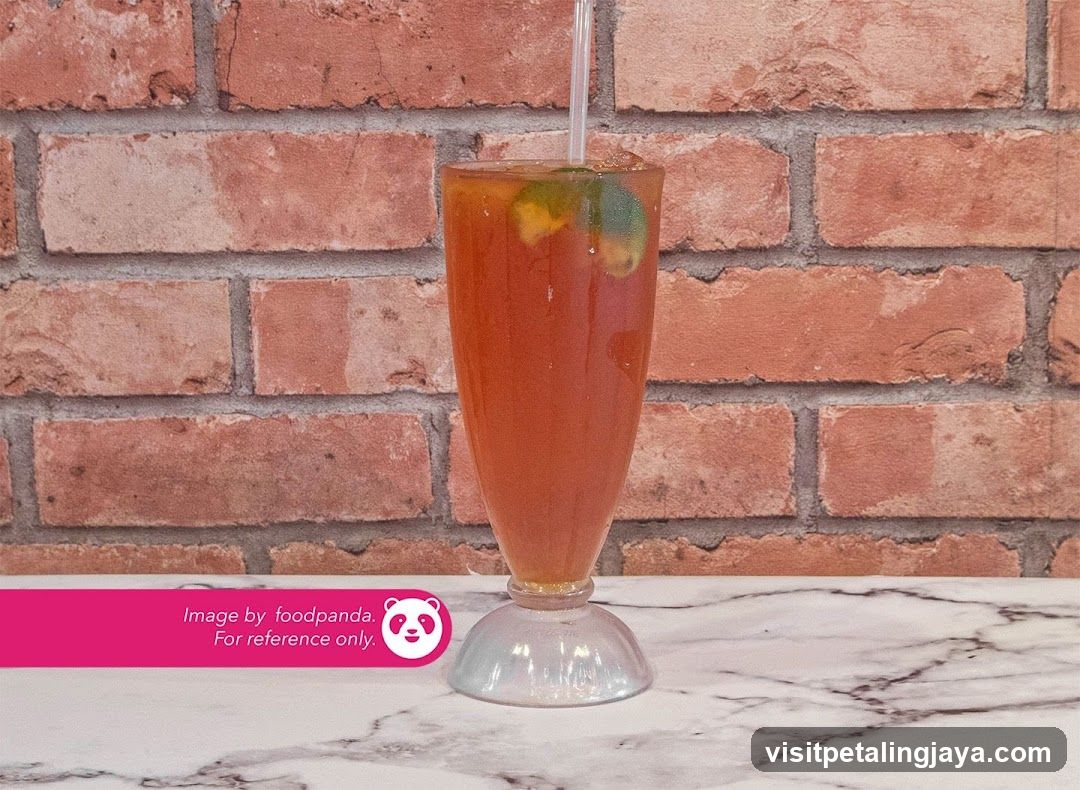 Beverage with Straw in Glass