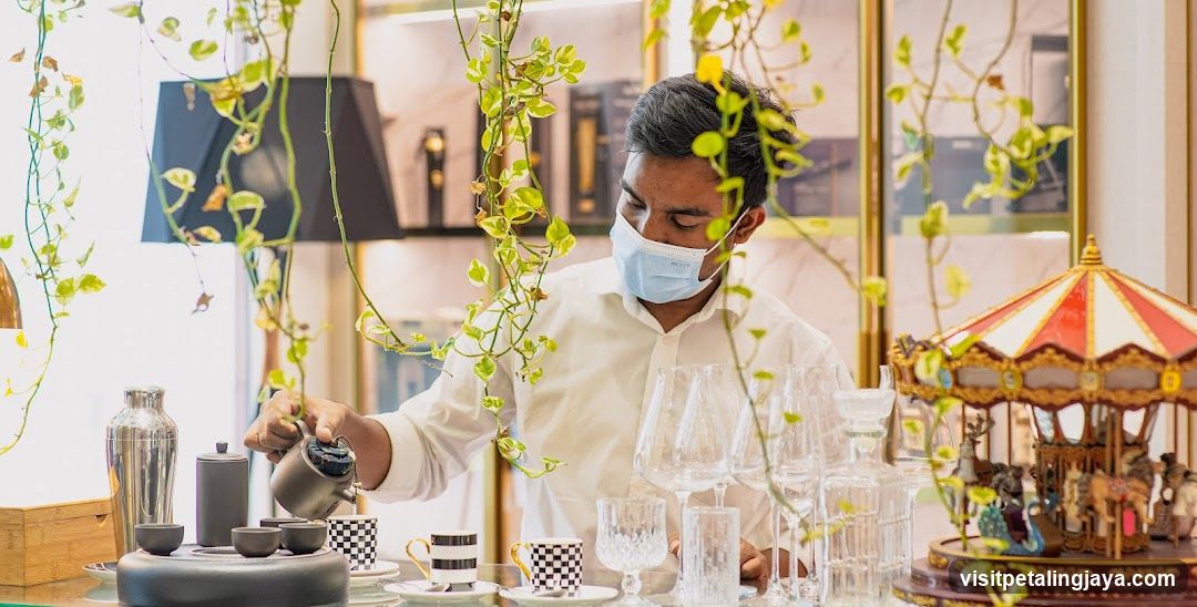 Barista Pouring Tea