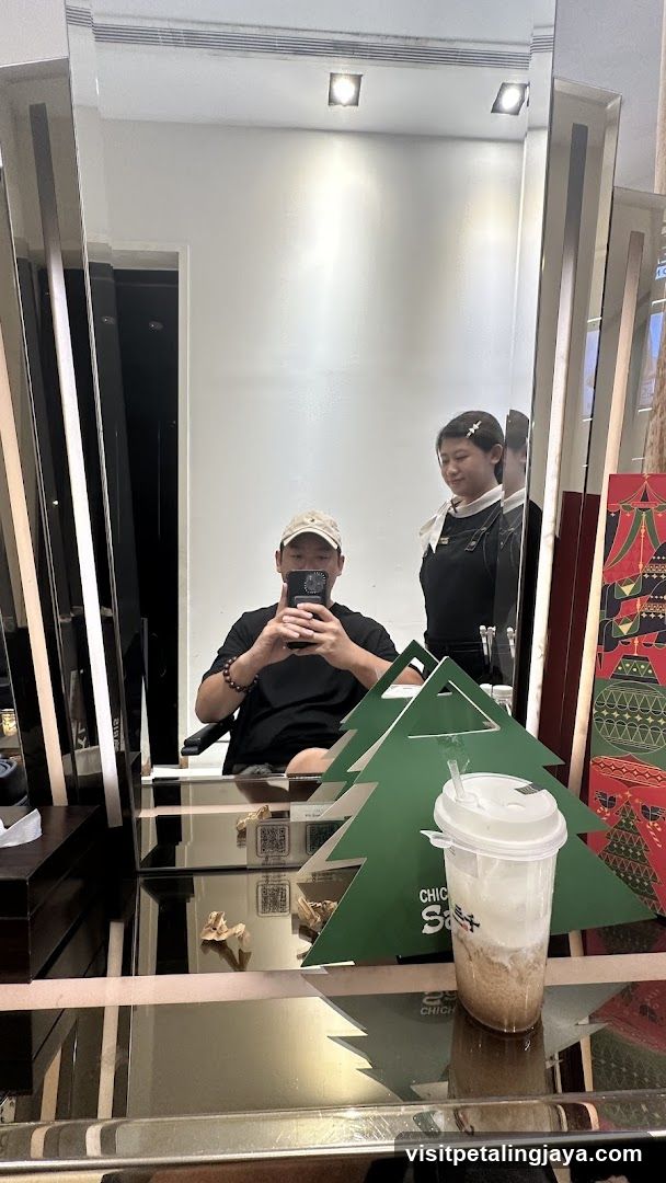 Mirror selfie with staff and drink