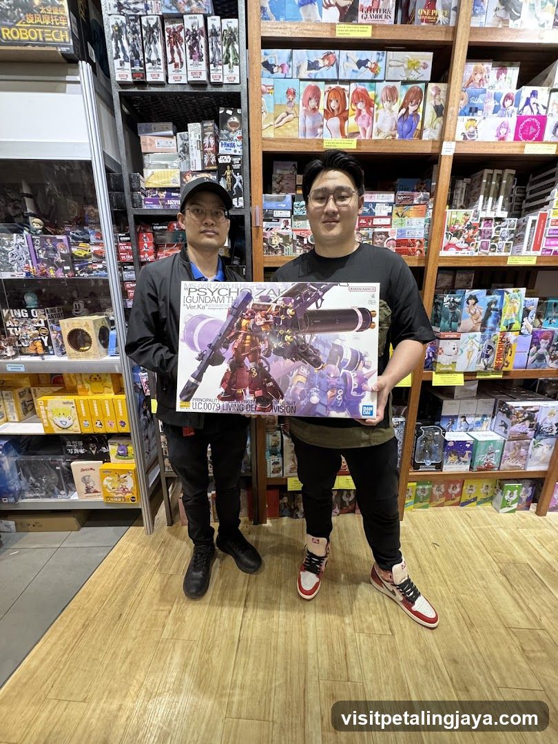 Two men holding a model kit box in a toy store