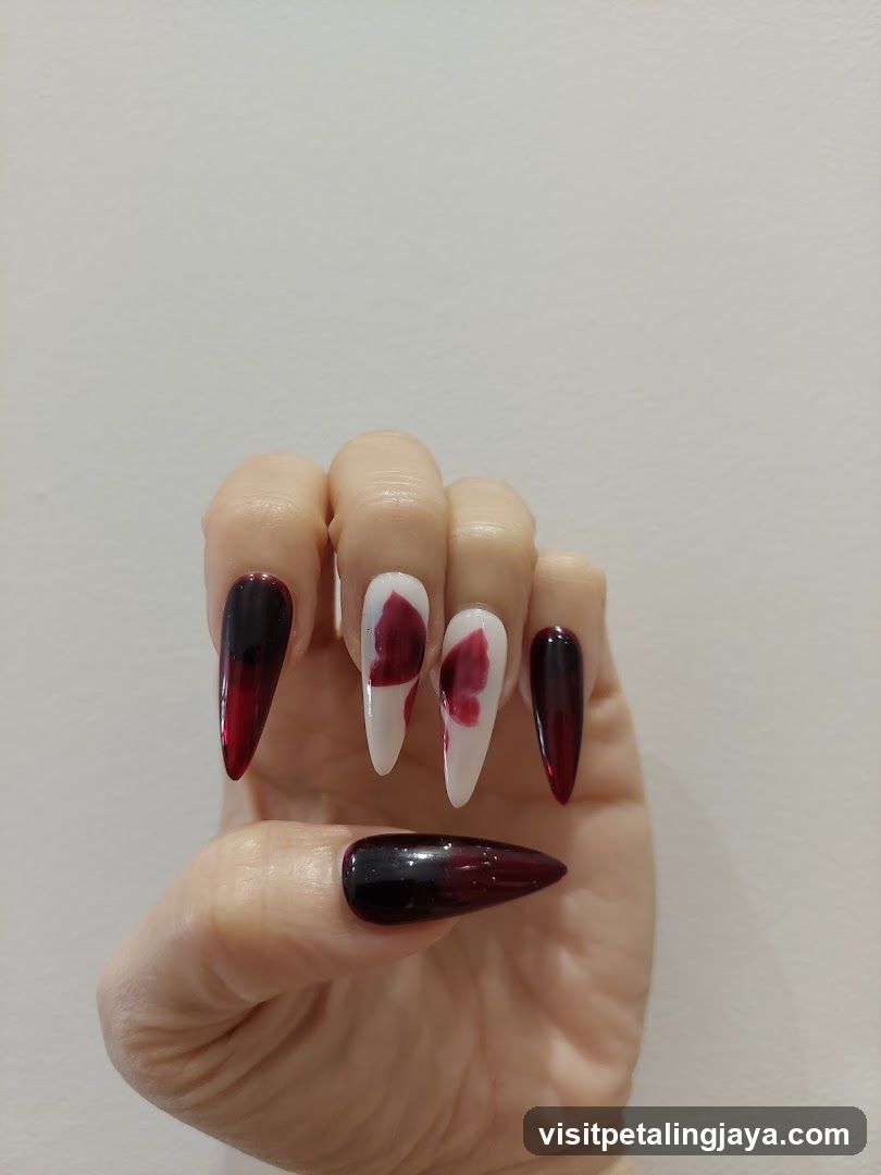 Dark and White Blood Splatter Nails