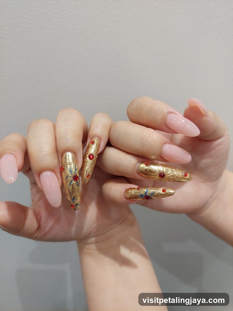 Elaborate Gold and Pink Nail Art