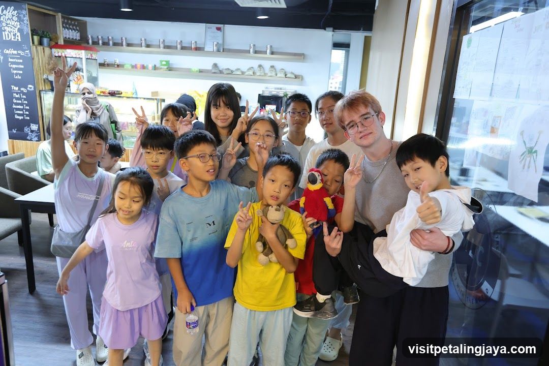 Group of children and adults indoors