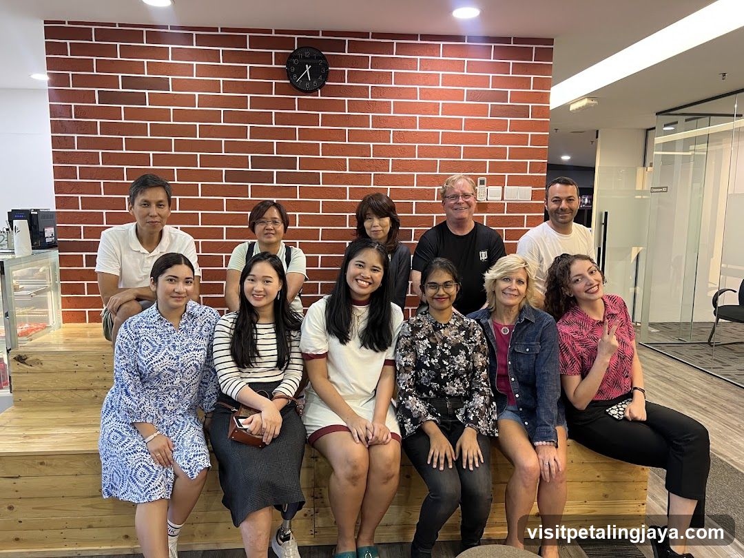 Group Photo in Office Lobby