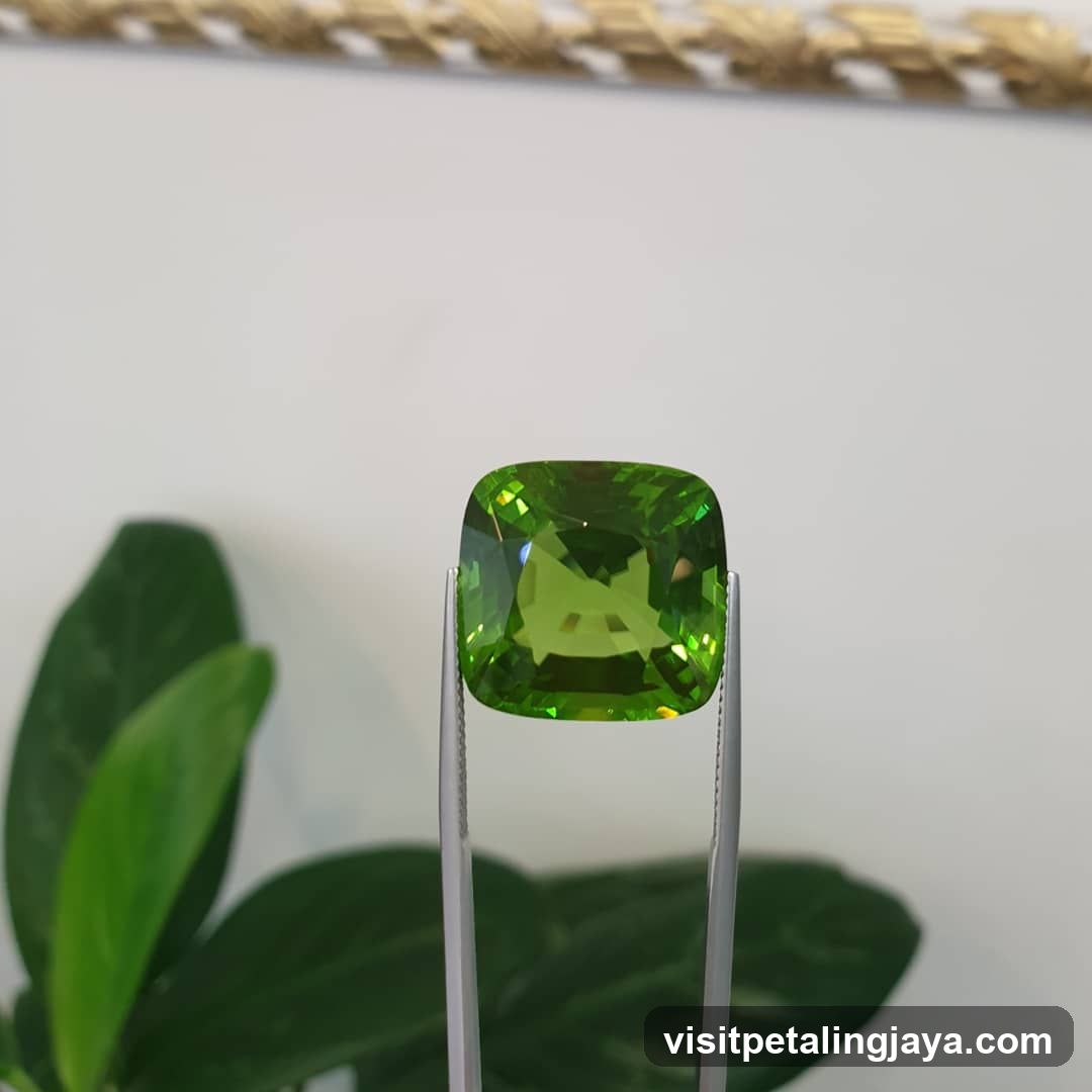 Green Gemstone on Tweezers