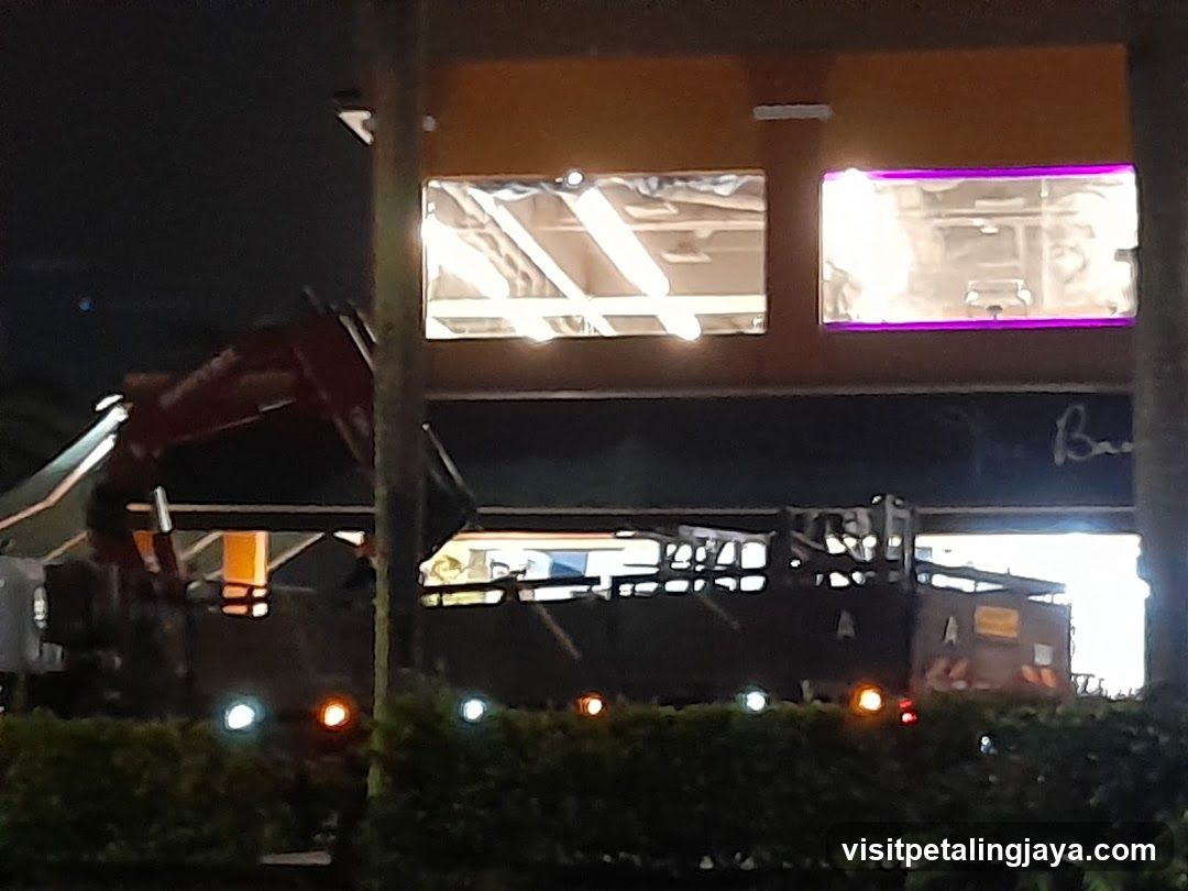 Night scene with construction and storefront