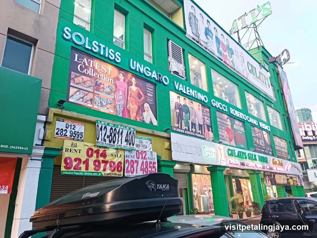 Fashion Store Facade with Solstice and Ungaro Signage