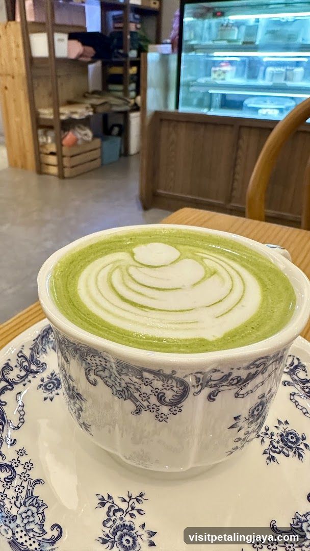 Matcha Latte in a Decorative Cup