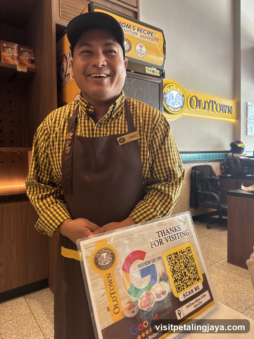 OldTown Staff Member Holding Google Review Sign