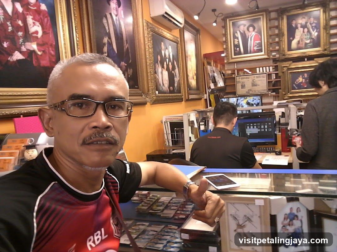 Portrait of a man in a photo shop interior