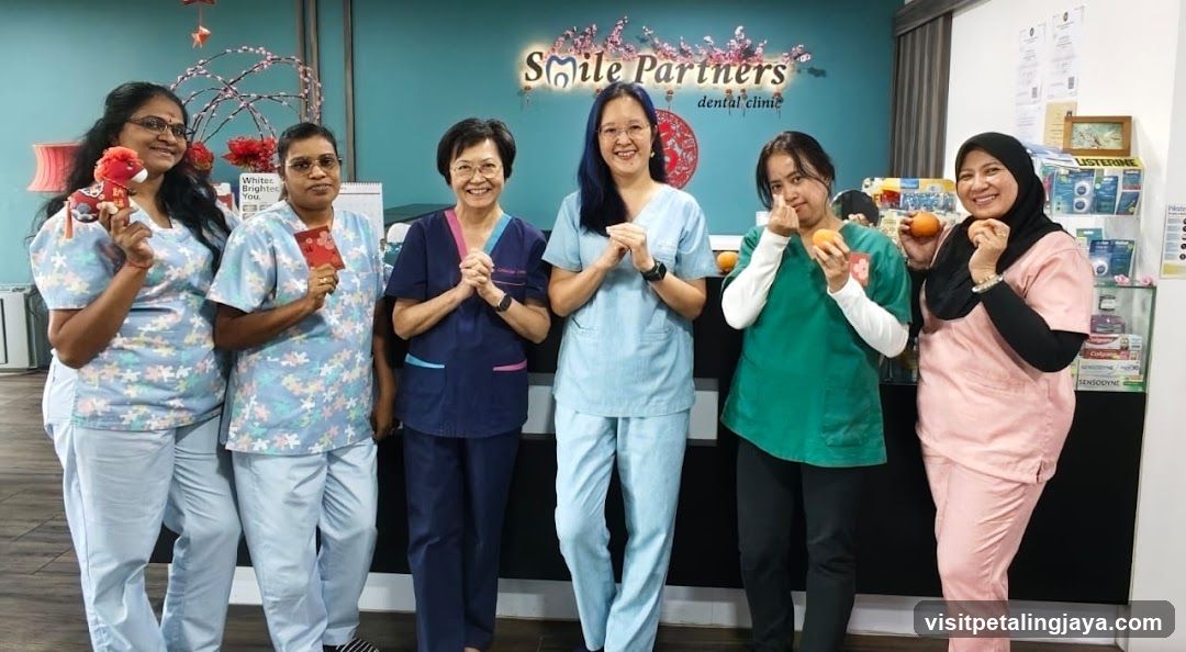 Smile Partners Dental Clinic Staff with Fruits