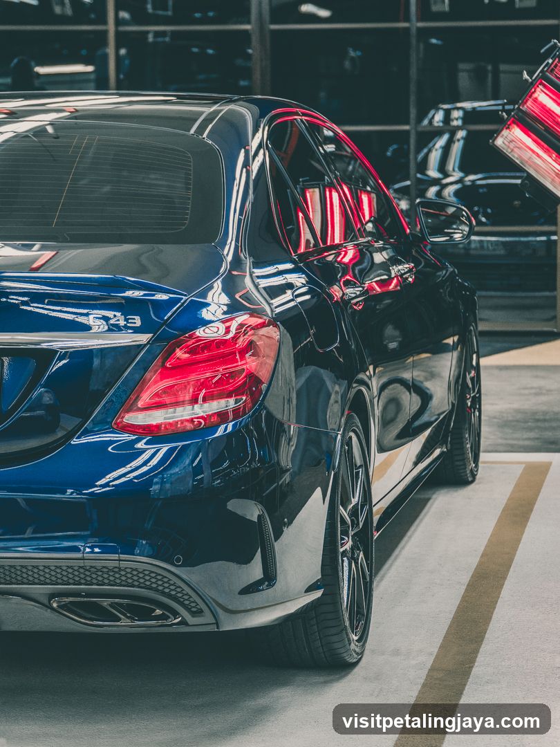 Blue Mercedes C63 in a garage