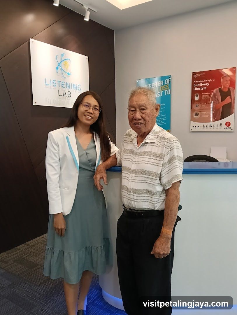 Listening Lab Interior with Staff and Senior Guest