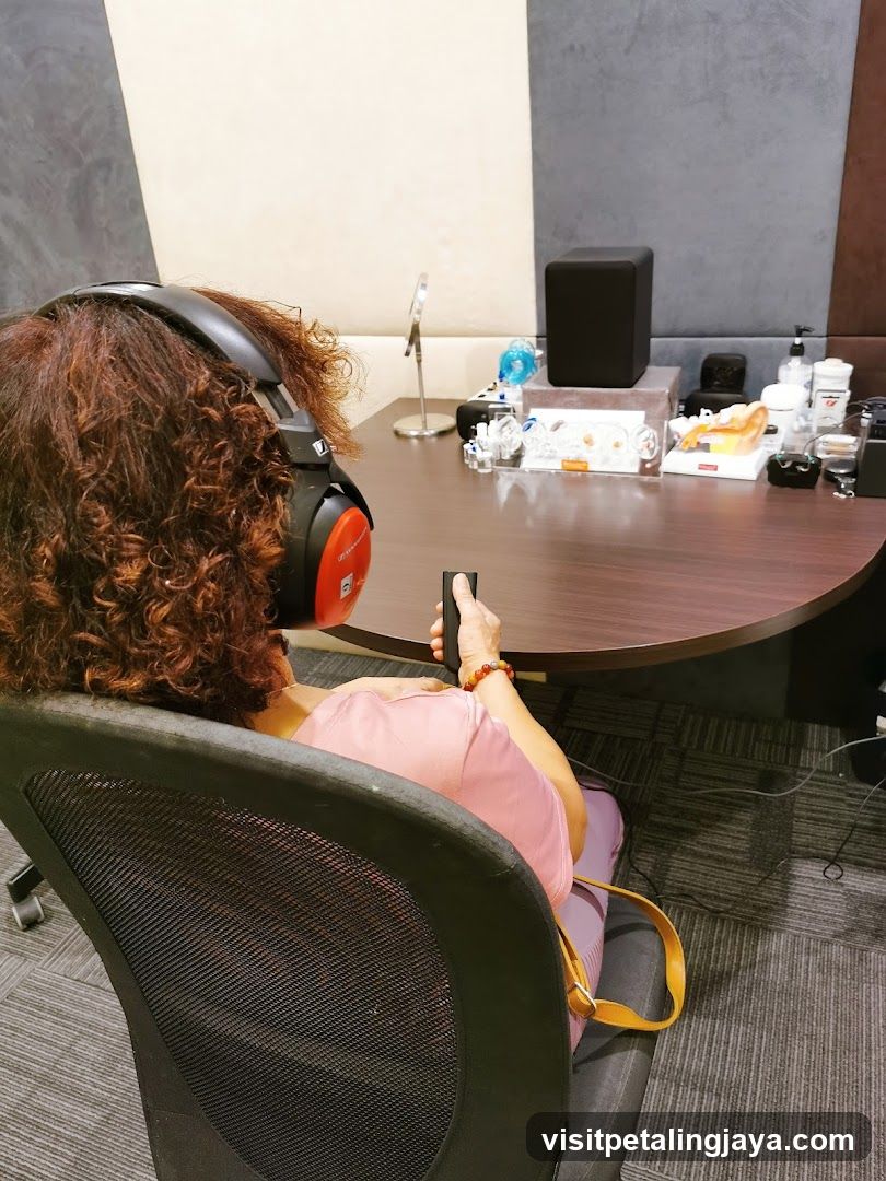 Person Listening to Audio in a Room