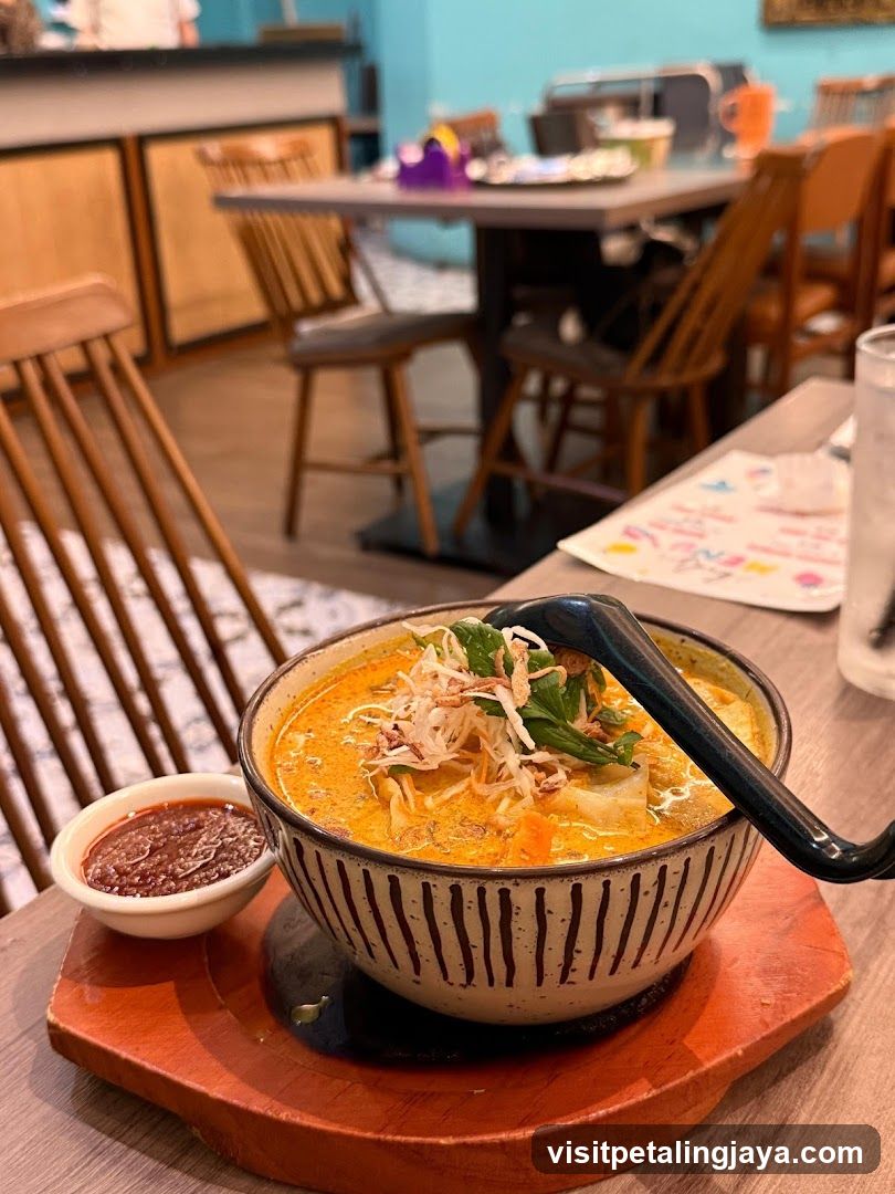 Bowl of Curry with Side Dipping Sauce