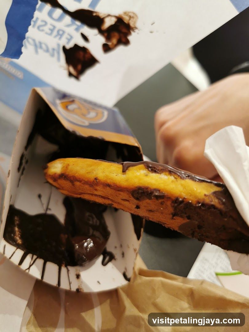 Chocolate Eclair with Sauce