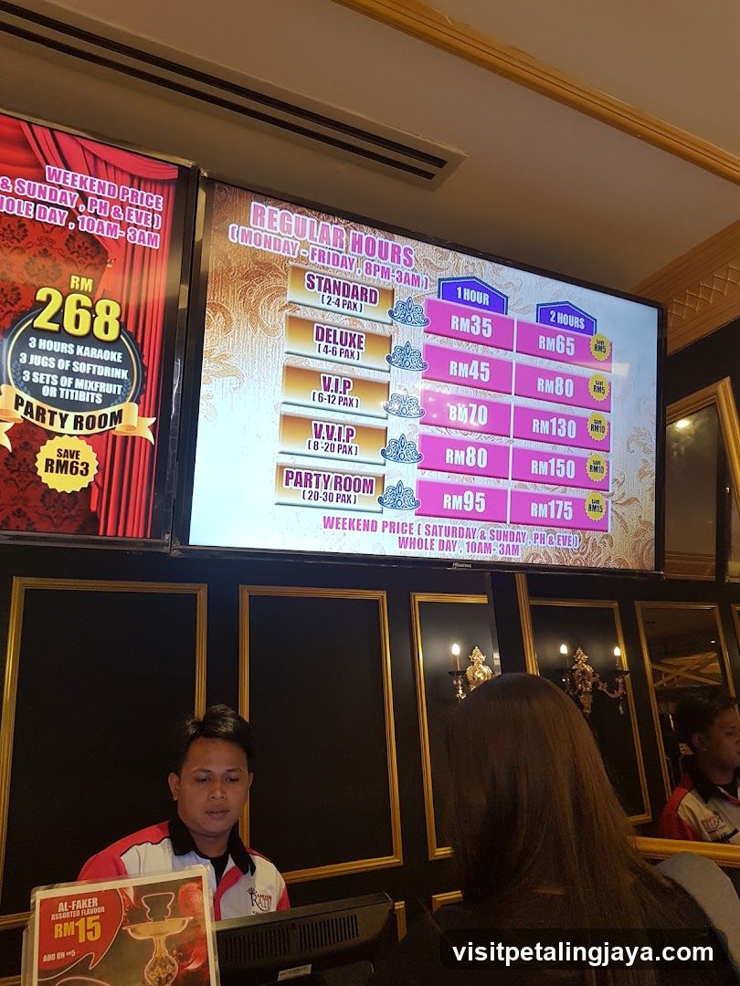 Karaoke Room Price Board and Staff