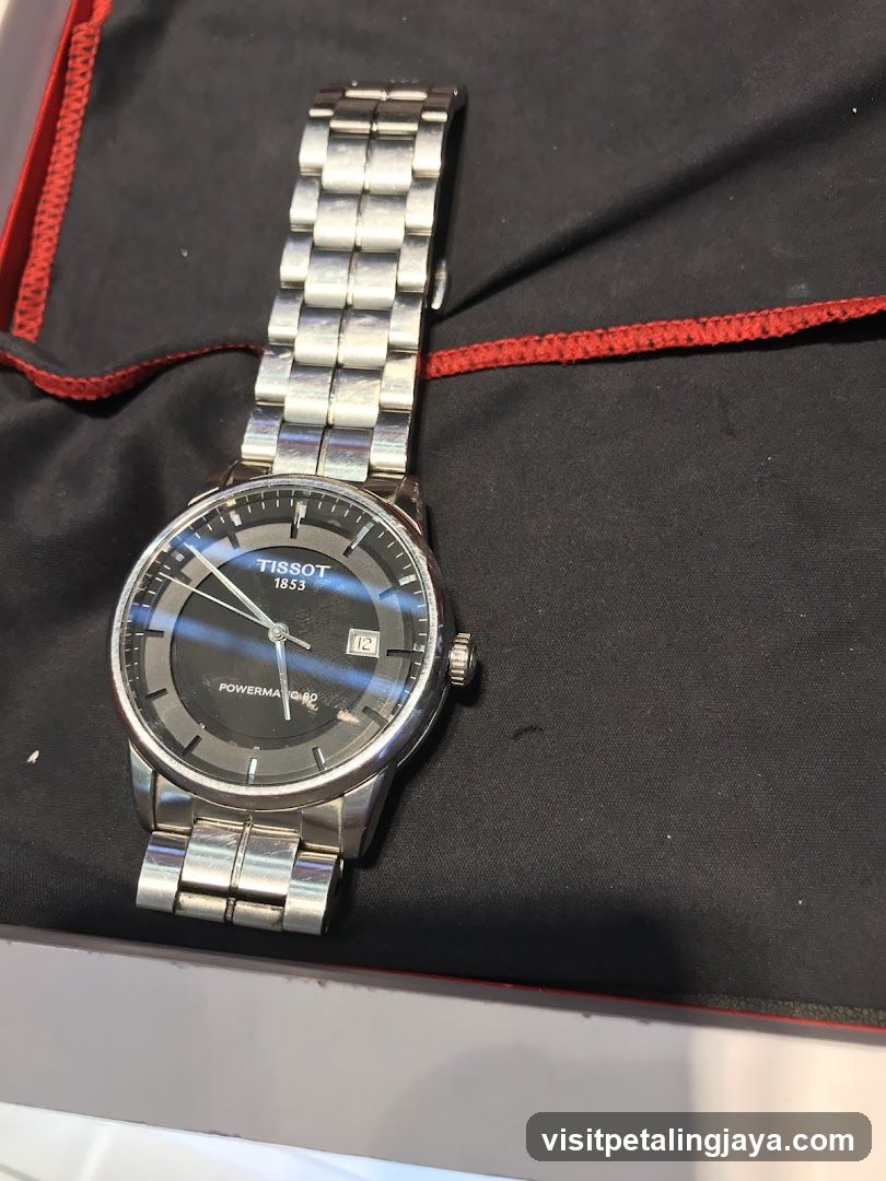 Tissot Watch on Black Cloth